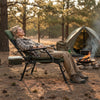 Oversized foldable fishing chair in green with adjustable backrest, perfect for camping and outdoor relaxation.