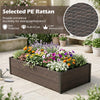 Raised garden bed made of durable PE rattan with removable liner, ideal for planting flowers and herbs on patios or balconies.
