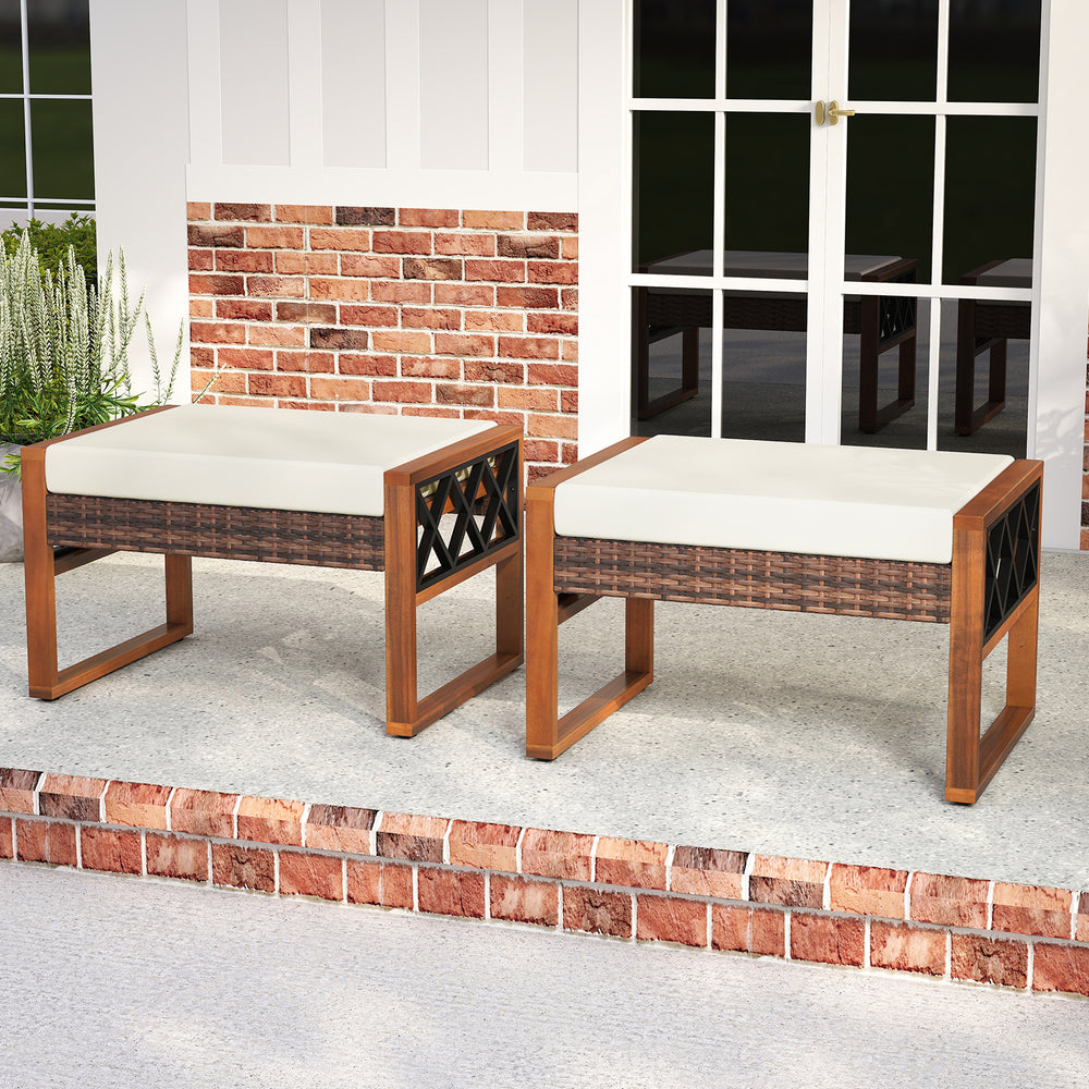 Set of 2 PE rattan wicker ottomans with beige removable cushions, ideal for outdoor patios and versatile seating.