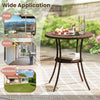 Round PE wicker patio bistro table with tempered glass top and shelf, ideal for outdoor use on patio or balcony.