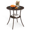 Round PE wicker patio bistro table with tempered glass top and shelf, ideal for outdoor use on balcony or garden.