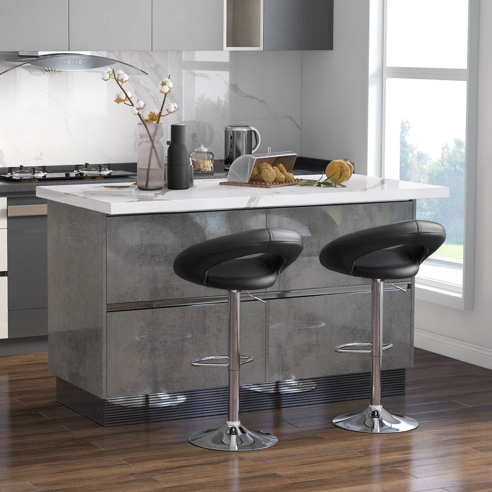 Height adjustable black bar stools set of 2 with hollow back and footrest, perfect for modern kitchen spaces.