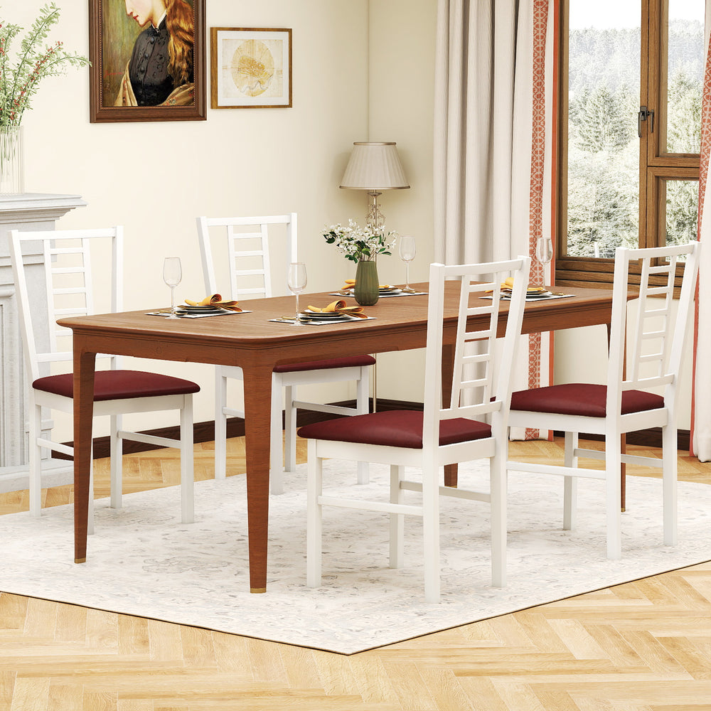 Set of four white PU leather upholstered dining chairs with high backrests, perfect for kitchen or dining room use.