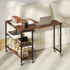 Patented Large 360-Degree Free Rotating Sofa Side Table with Wheels and Storage Shelf-Walnut - Gallery View 1 of 10