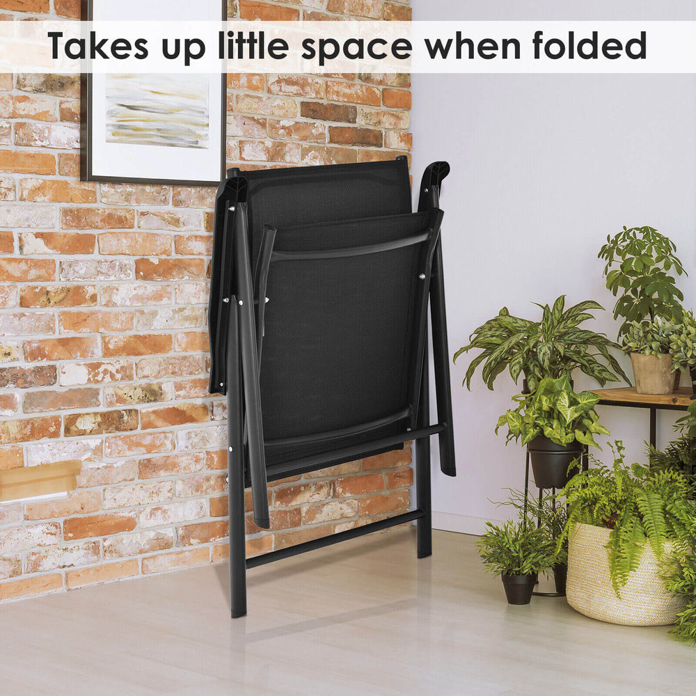 Black folding chair set with ergonomic armrests, compact design for easy storage, ideal for indoor and outdoor use.