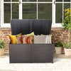 Outdoor storage box with zippered liner and cushions, made of hand-woven brown PE rattan, ideal for patio use.