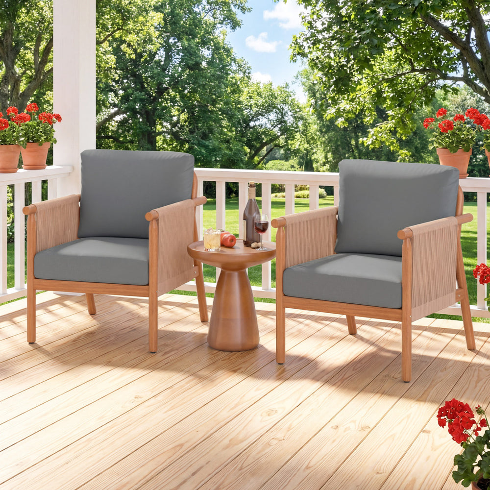 Acacia wood patio chairs with gray cushions and woven rope armrests, perfect for backyard relaxation.