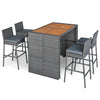 Patio dining set featuring a solid acacia wood tabletop and grey PE wicker bar stools with soft cushions for comfort.