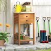 Acacia wood storage cabinet with faux marble countertop, featuring two drawers and ample space for patio organization.