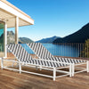 Adjustable outdoor chaise lounge chairs with a sturdy metal frame, featuring a checkered pattern, perfect for poolside.