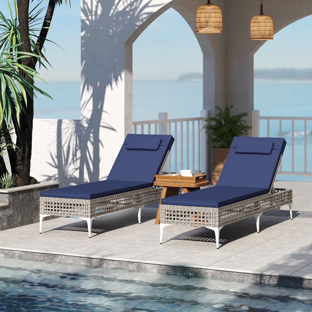 Patio chaise lounge chair with navy cushion, adjustable backrest, and PE wicker, perfect for poolside relaxation.