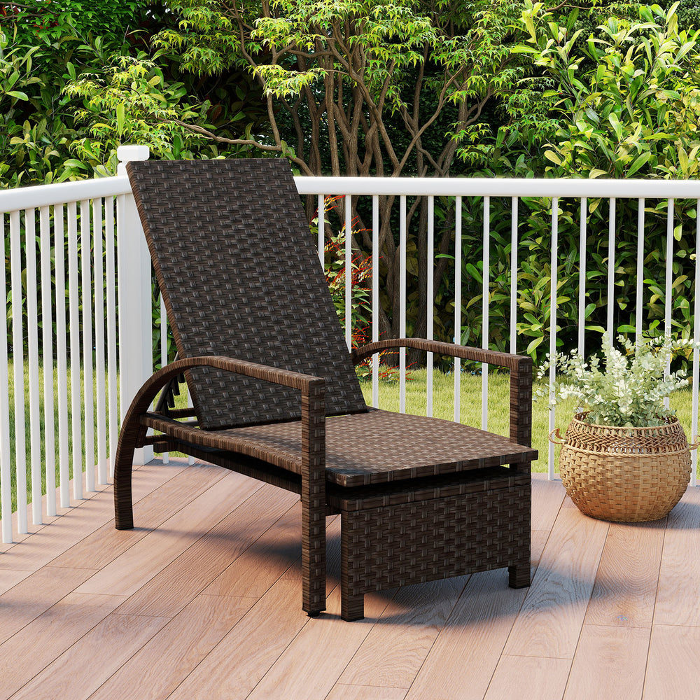 Patio chaise lounge chair in dark rattan with adjustable backrest and retractable ottoman for outdoor relaxation.