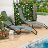 Two light green folding patio chaise loungers with rocking design, perfect for poolside relaxation and easy storage.