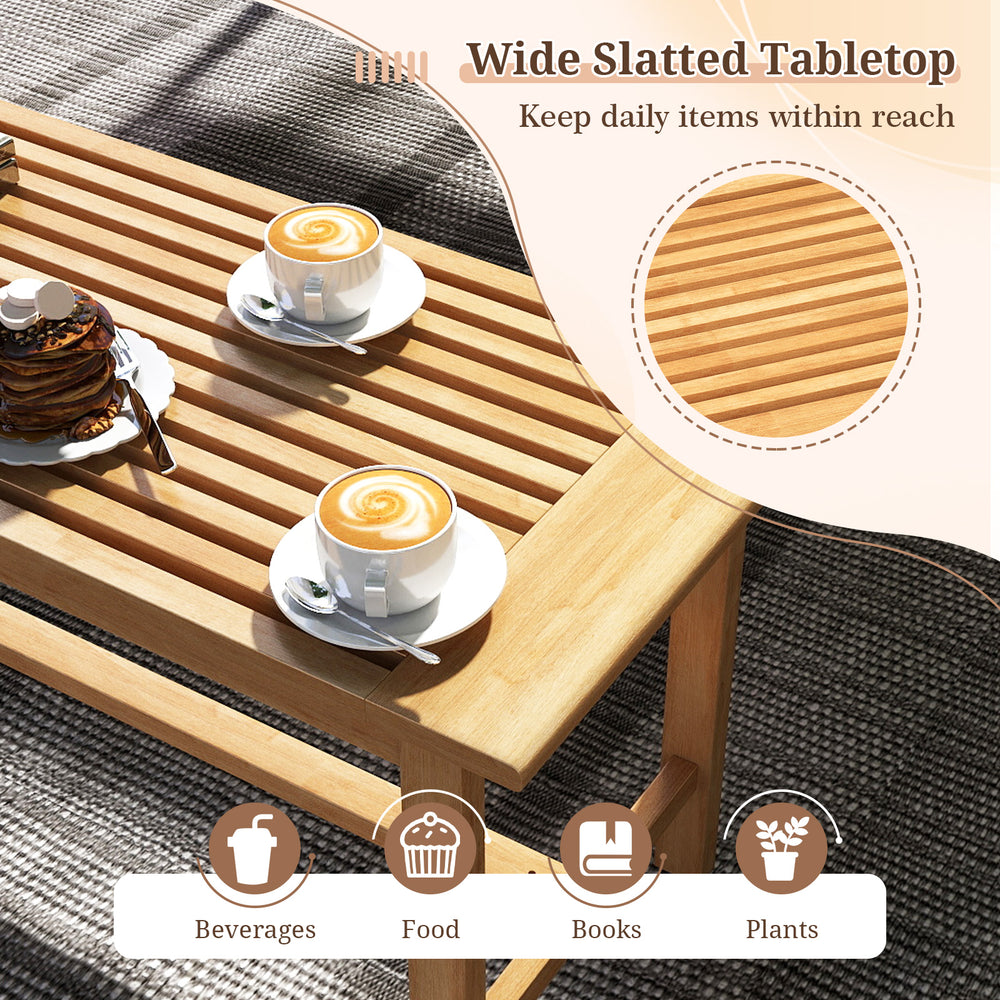 Rectangular patio coffee table with a wide slatted teak wood tabletop, ideal for outdoor use and placing beverages and.
