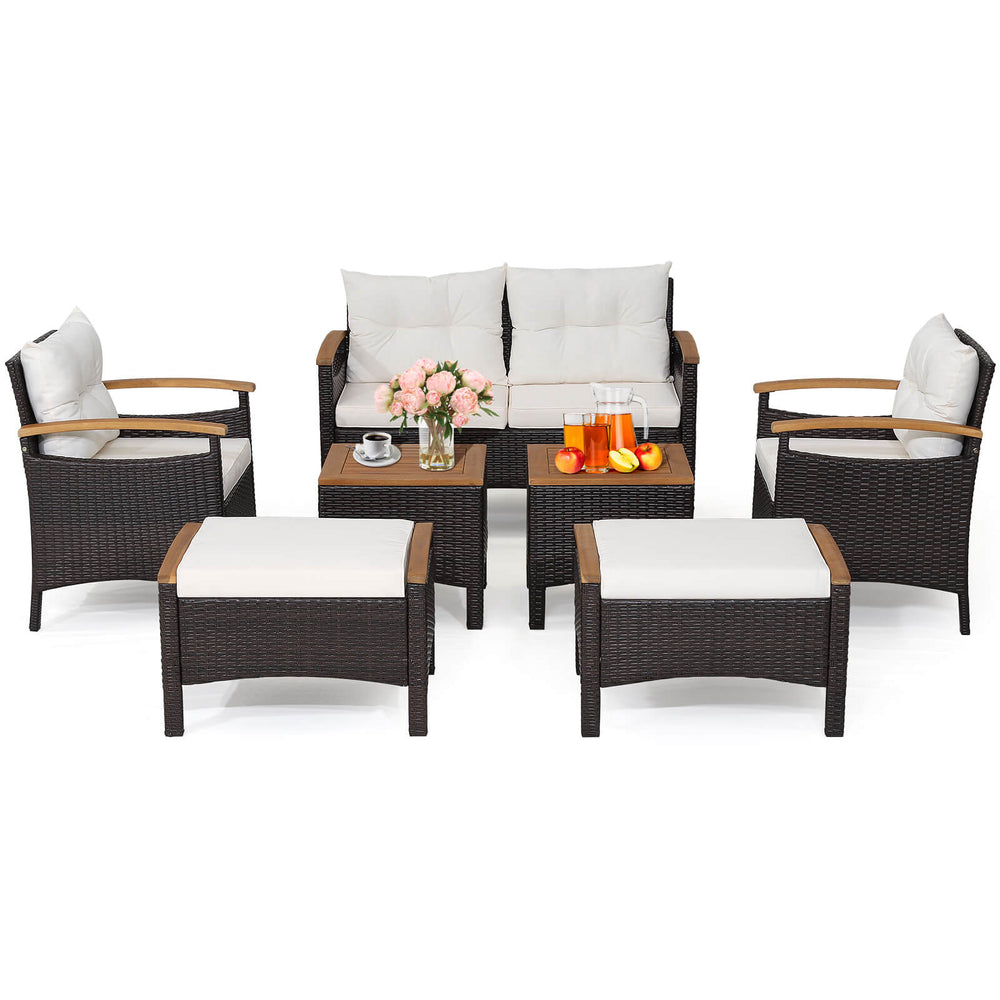7-piece rattan patio sofa set featuring acacia wood tabletop and armrests, ideal for outdoor relaxation in any space.