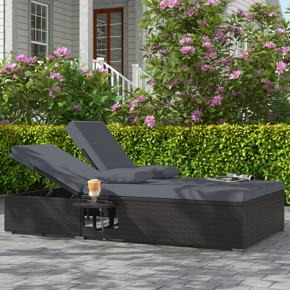 Patio double chaise lounge in gray with adjustable backrests, soft cushions, and folding side trays for outdoor.