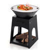 Patio fire pit with grill and ash box, featuring a black metal design and firewood storage for outdoor cooking.