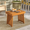 Patio foldable side table made of acacia wood with slatted tabletop, perfect for backyard or poolside use.