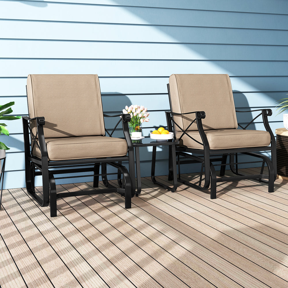 Patio glider rocking chairs with thick brown cushions and metal frame, perfect for outdoor relaxation on a porch or.