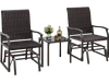 Two brown rattan gliding chairs with a tempered glass coffee table, perfect for backyard relaxation.