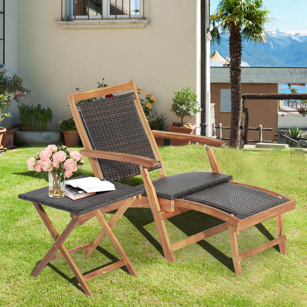 Folding lounge chair with retractable ottoman and acacia wood table, perfect for patio and garden relaxation.