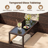 Tempered glass tabletop with a built-in coffee table on a brown wicker patio loveseat set for outdoor relaxation.