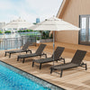 Set of four brown PE rattan chaise lounges with umbrellas, perfect for outdoor relaxation by the poolside.