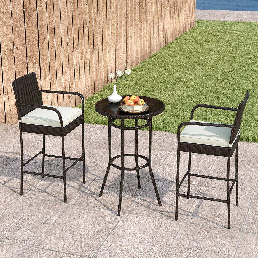 Bar height table and two chairs with white cushions, made of PE wicker, perfect for outdoor porch relaxation.