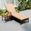 Patio rattan chaise lounge in beige with adjustable backrest and side table, perfect for outdoor relaxation.