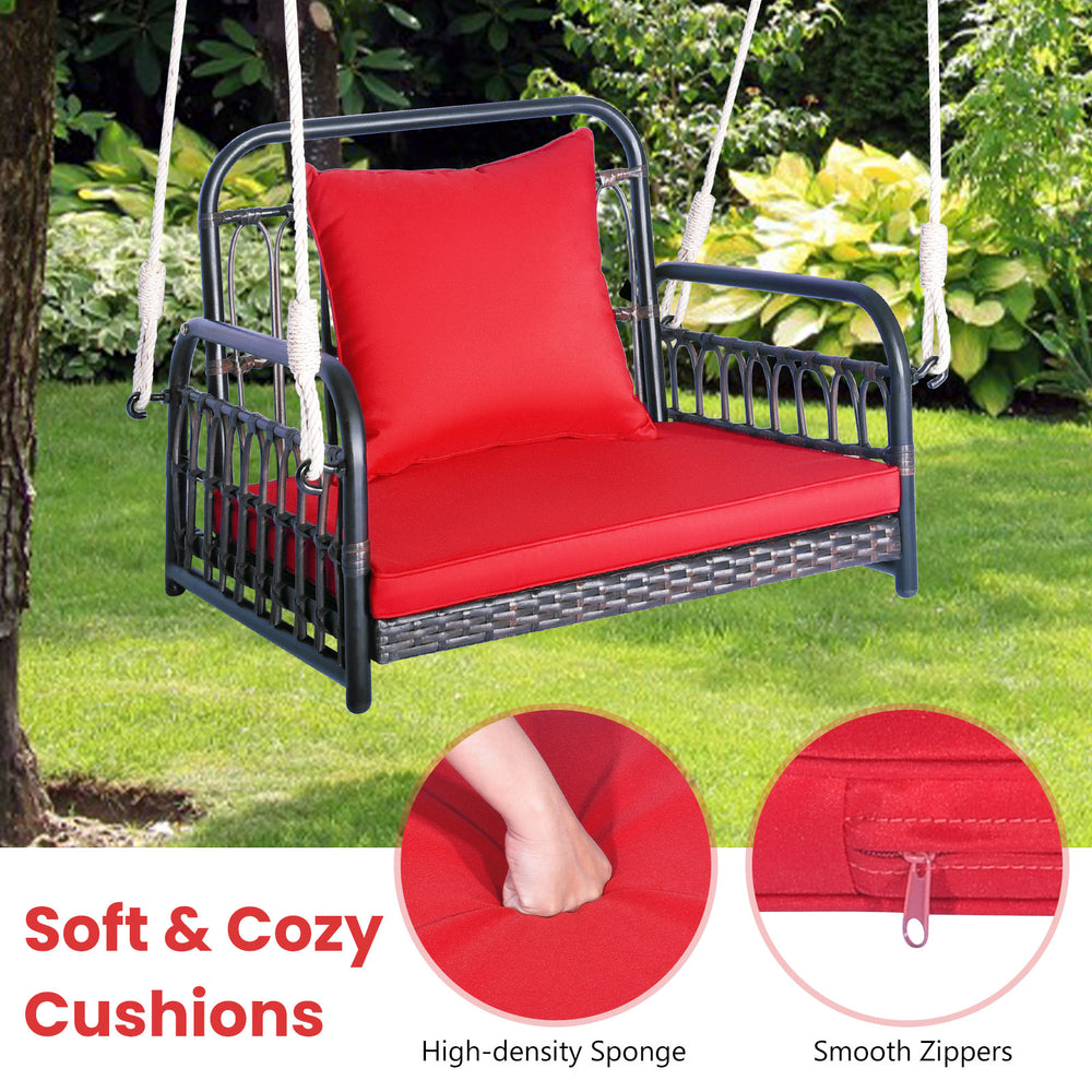 Close-up of the red cushion on the patio rattan porch swing chair, showcasing the zipper design for easy cleaning and.