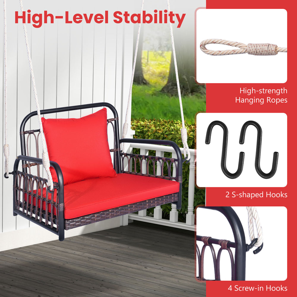 Patio rattan porch swing hammock chair with red cushion, featuring a stable metal frame and sturdy hanging ropes for.