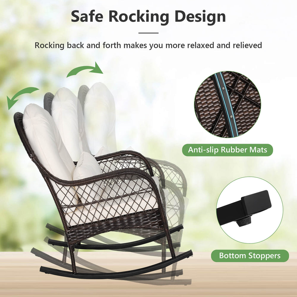 Patio rattan rocking chair with white cushions, featuring a stable base and ergonomic design for outdoor relaxation.