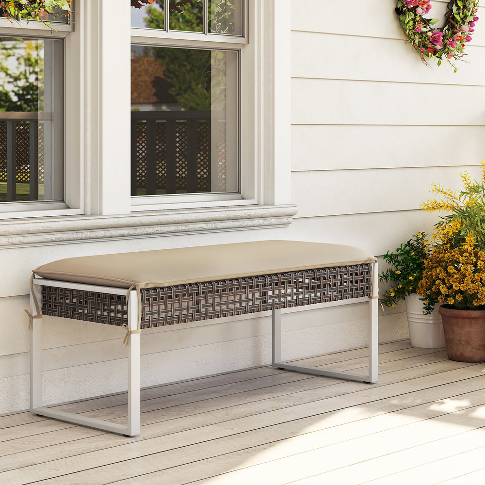 43-inch patio rectangle ottoman with beige seat cushion and hand-woven PE rattan, ideal for backyard or porch use.