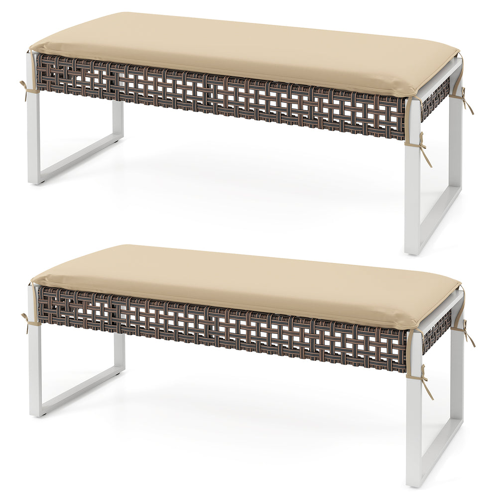 Set of two 43-inch patio rectangle ottomans with beige seat cushions and reinforced metal legs for outdoor use.