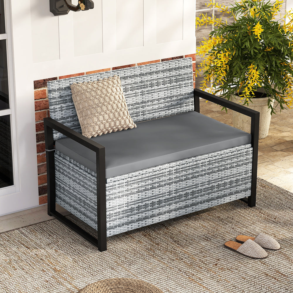 Patio storage bench loveseat in gray wicker with cushion, featuring built-in storage for outdoor use.