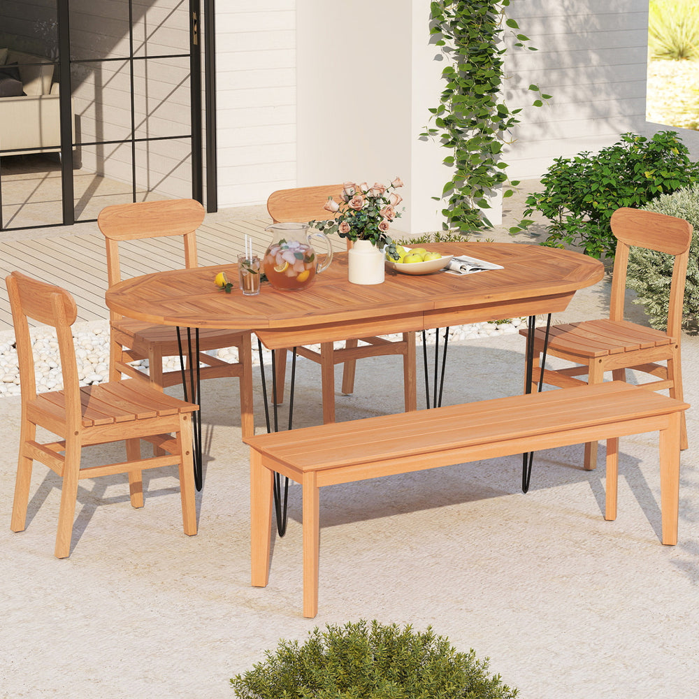 Teak wood armless dining chair with slatted seat, featuring a natural finish, ideal for backyard or poolside dining.
