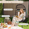 Spacious patio wicker egg chair with ergonomic design, soft cushions, and sturdy metal frame for outdoor relaxation.