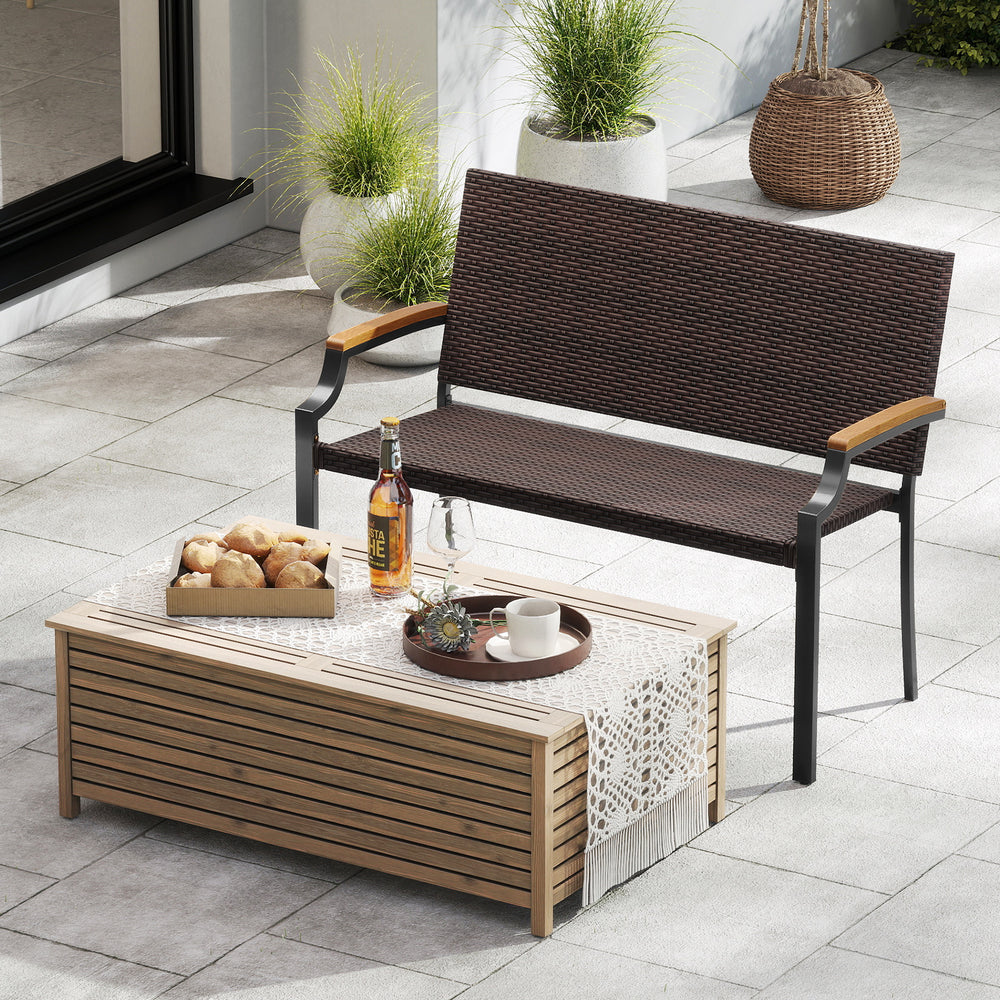 Patio wicker loveseat chair with acacia wood armrests and metal frame, ideal for outdoor relaxation on the patio.