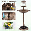 Pedestal bird bath with solar light, featuring a bird feeder and flower planter, perfect for garden decor.