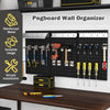 Wall-mounted pegboard kit with 3 black metal boards and assorted hooks for organizing tools in garages and workshops.