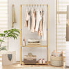Pine wood clothes rack with 2-tier open storage shelf, perfect for organized hanging clothes in a stylish living space.