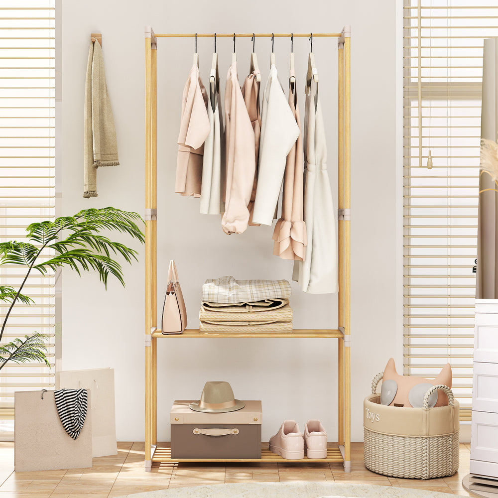 Pine wood clothes rack with 2-tier open storage shelf, perfect for organized hanging clothes in a stylish living space.