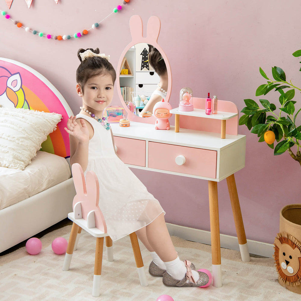 Kids vanity table and chair set in pink with rabbit mirror, featuring spacious drawers and ergonomic design for.