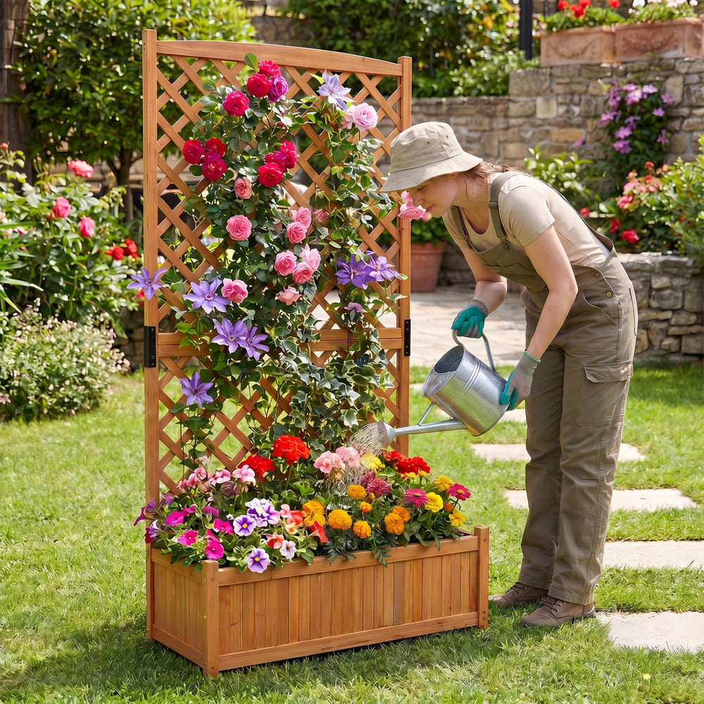 Wooden planter raised bed with trellis, featuring vibrant flowers and climbing plants, enhances any garden or patio setting.