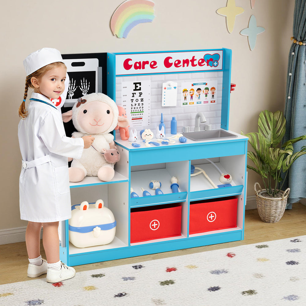 Play Doctor's Office Wood Medical Center Toy Set in blue, featuring an examine region and 29 medical accessories for.