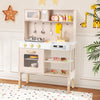 Height-adjustable pink play kitchen with dual stoves, microwave, and ample storage for imaginative role-playing fun.