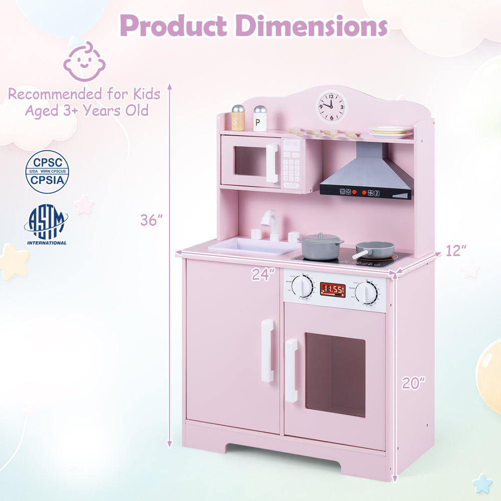 Wooden pink play kitchen for kids features a range hood, microwave, and multiple storage areas for imaginative cooking fun.