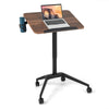 Pneumatic standing desk with adjustable height, anti-fall baffle, and cup holder, ideal for versatile workspace use.