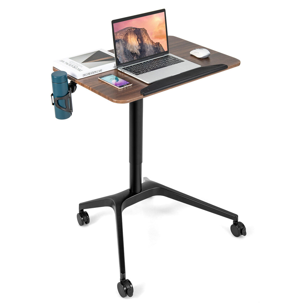 Pneumatic standing desk featuring a spacious tabletop, adjustable height, and a side cup holder for added convenience.