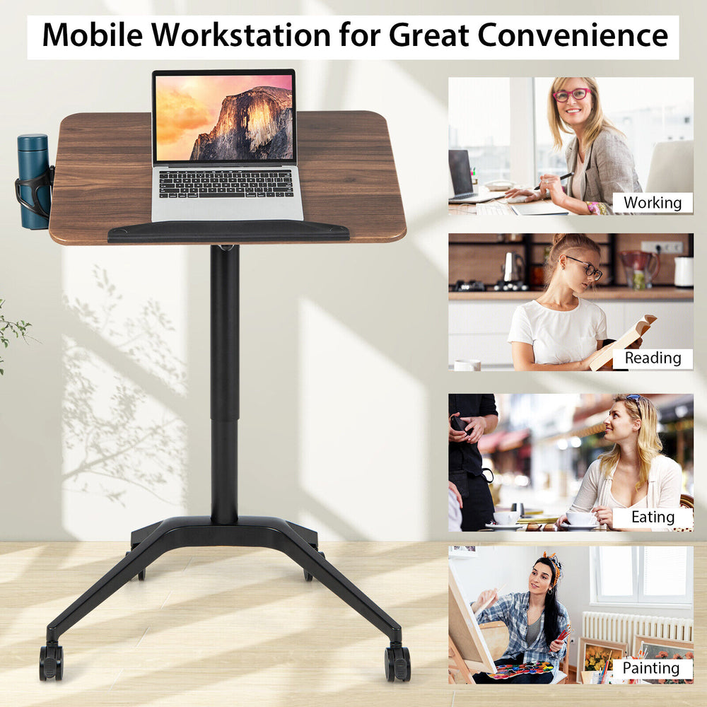 Pneumatic standing desk with adjustable height, anti-fall baffle, and cup holder, ideal for working, reading, or eating.